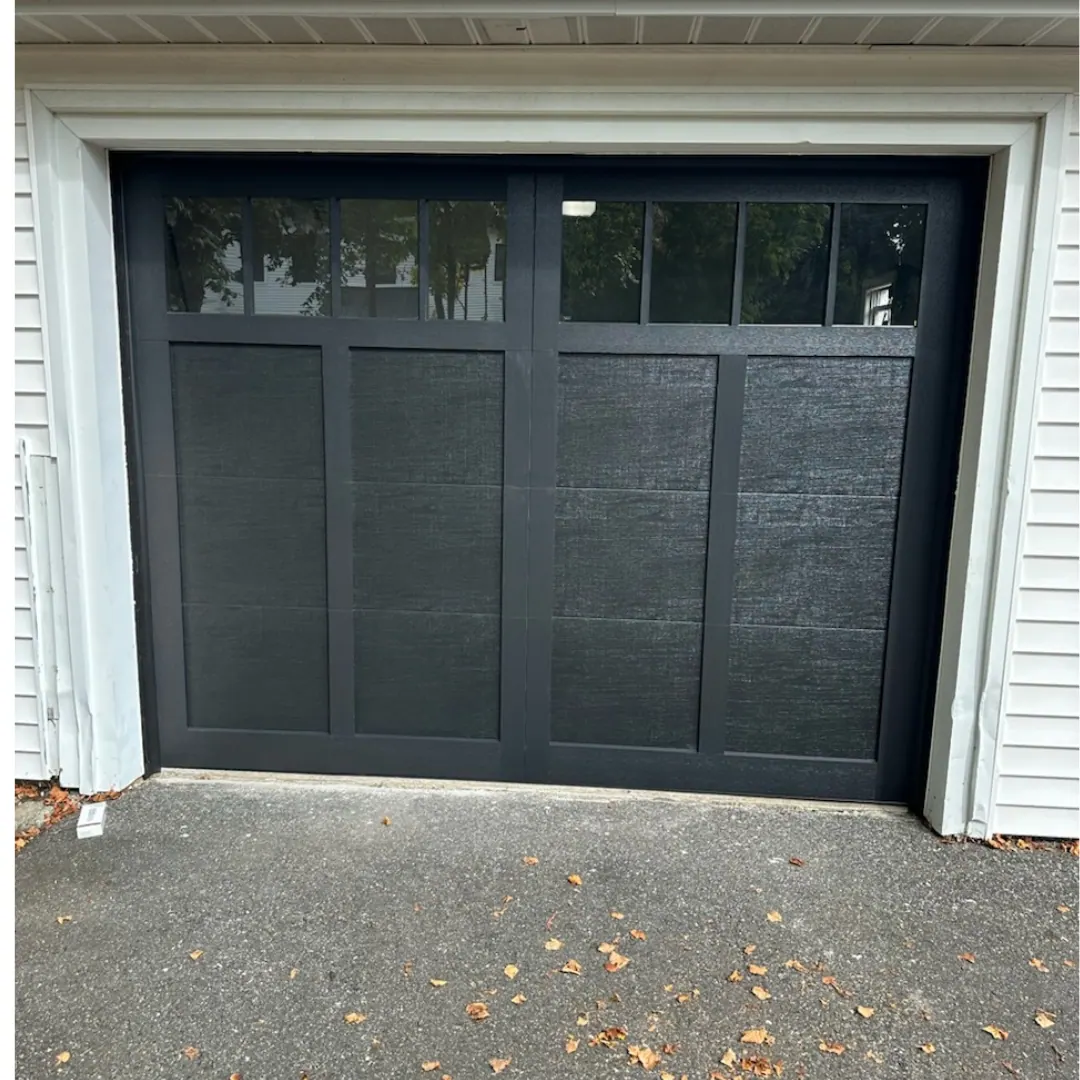 A black full-view double door on a new build