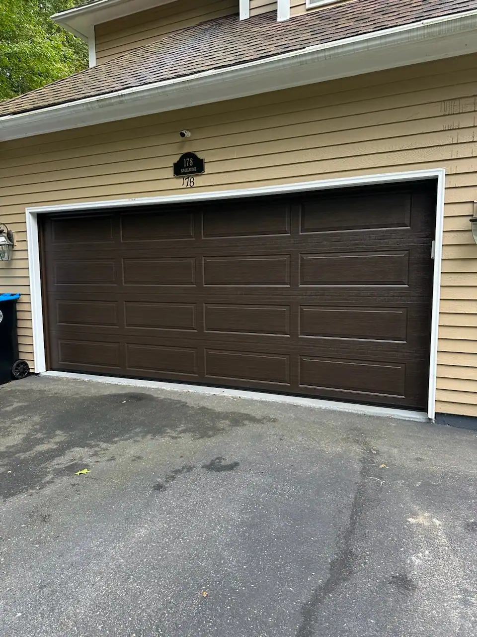 A new dark brown double door, closed up