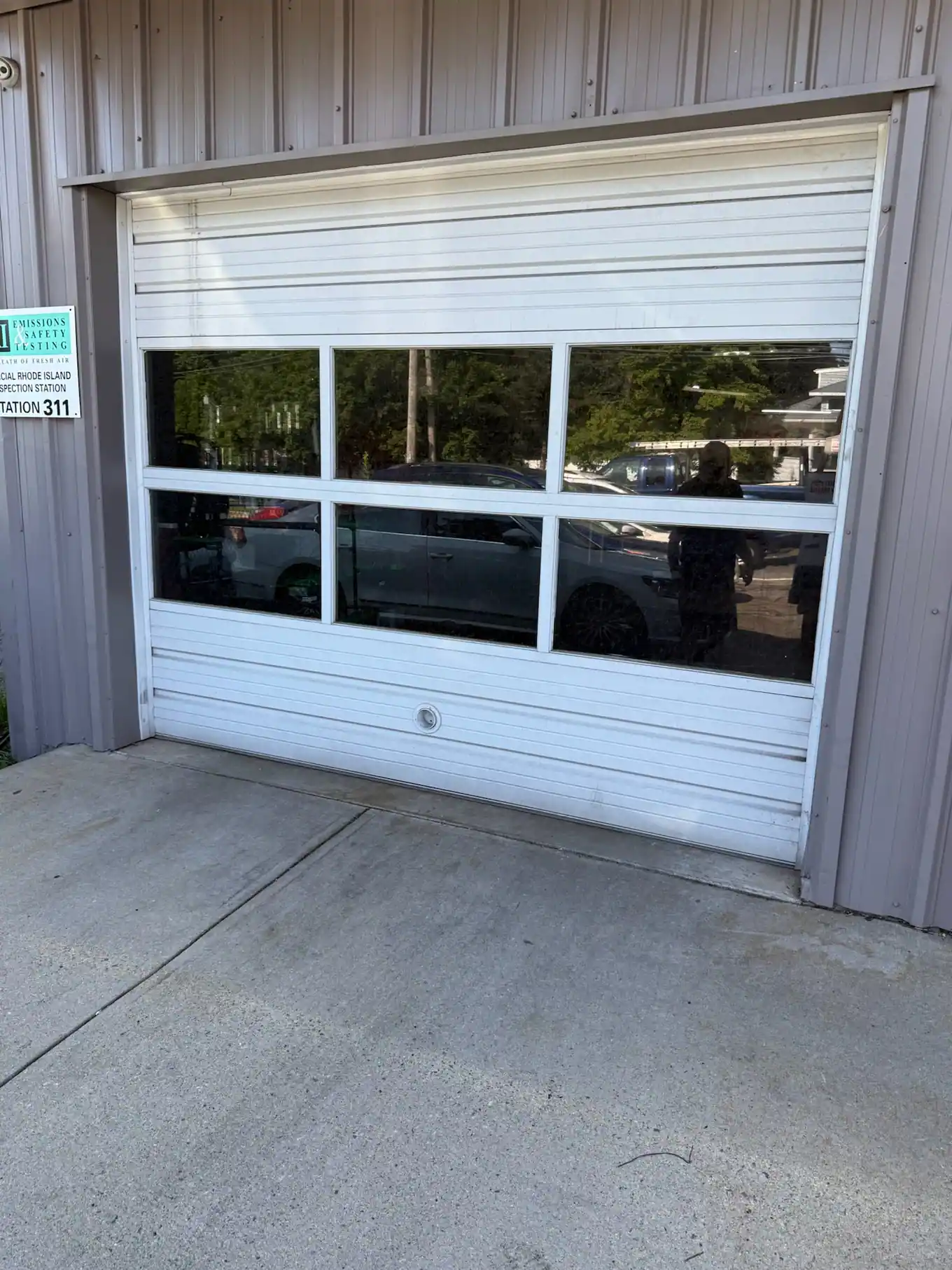 A full-view glass door on a commercial front