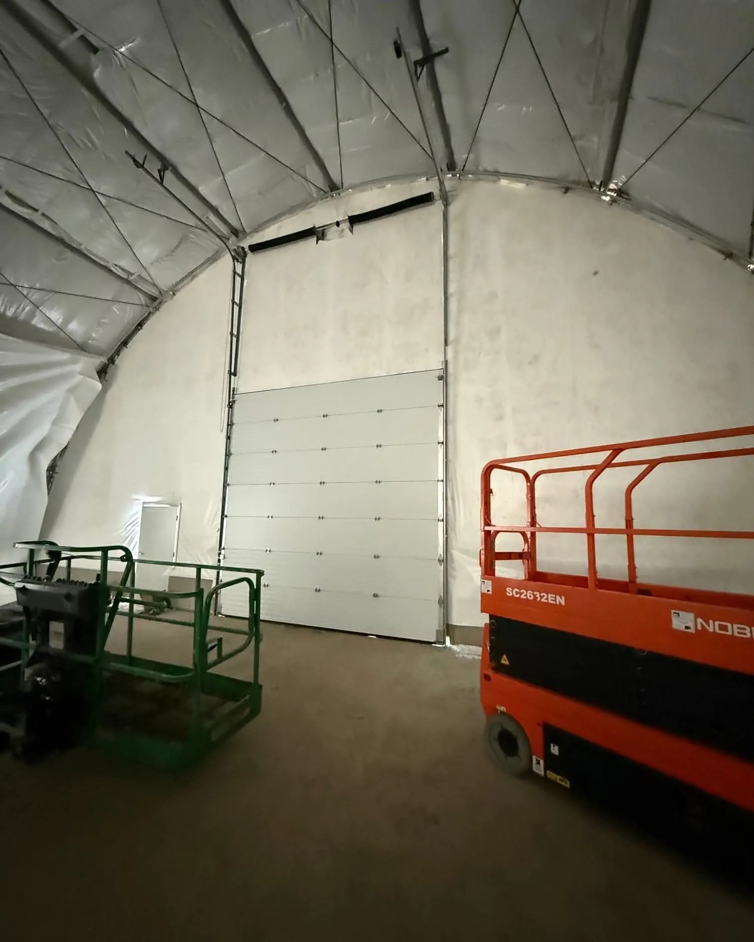 A high-lift commercial door going in