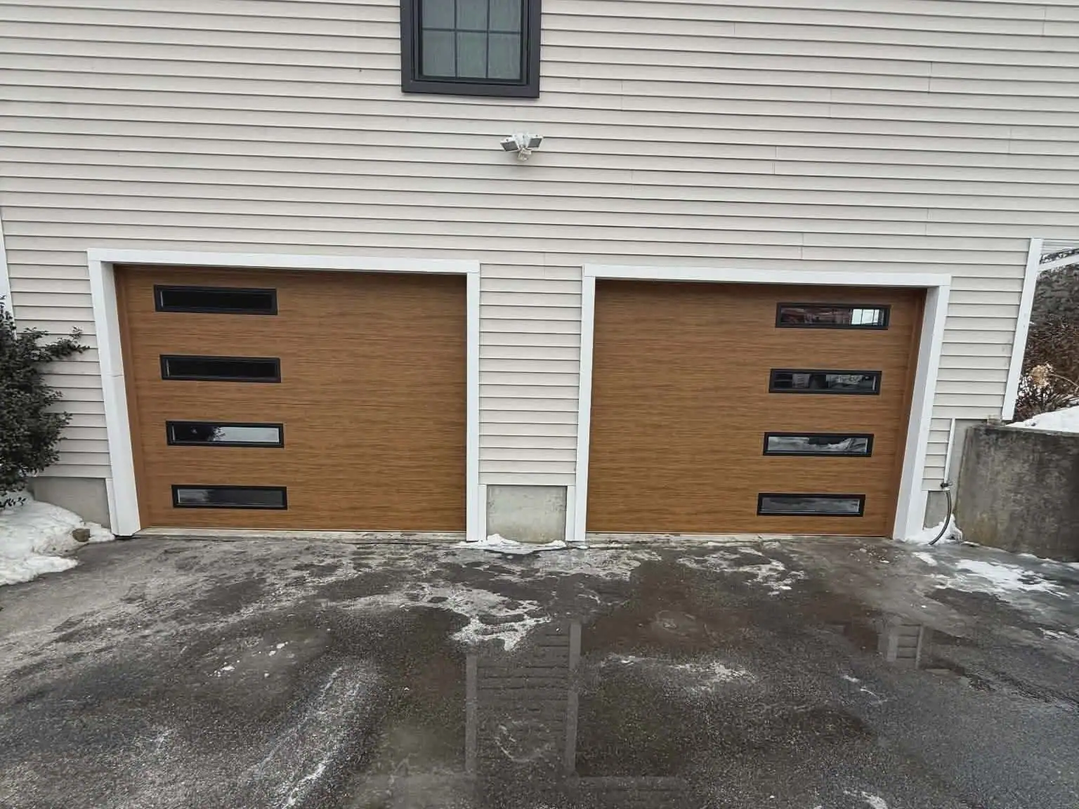 Wood-look plank doors with window accents